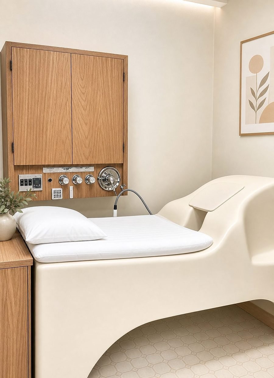 Private colon hydrotherapy treatment room in New Jersey with colonic irrigation equipment, fresh linens, and a calm, comfortable setting at C&A Wellness Center